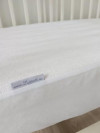 Наматрасник для прямоугольного детского матраса водонепроницаемый с бортом на резинке 100*70*20 см, цвет белый 9500х/0